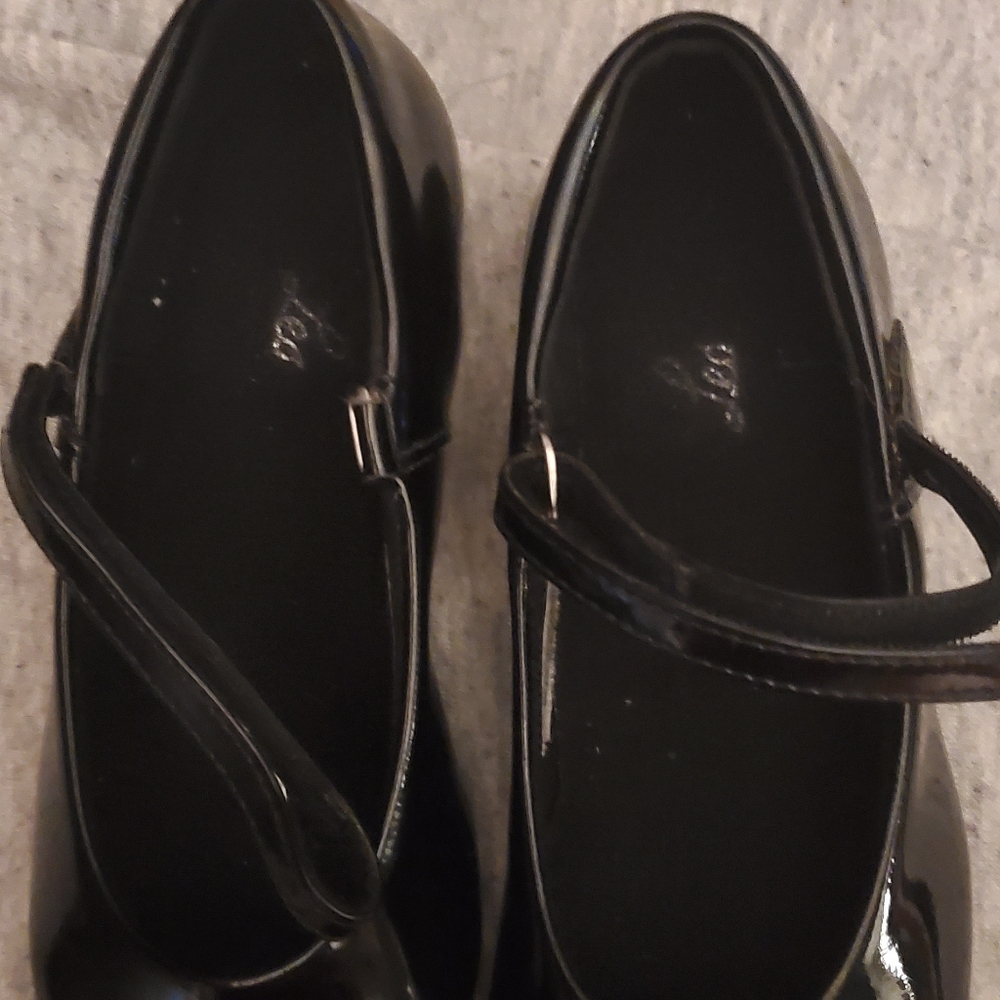 Tap shoes.  Child